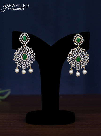 Zircon necklace with emerald & cz stones and pearl hangings in gold finish
