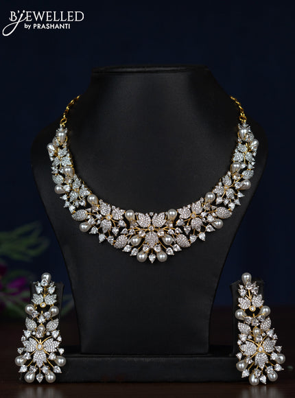 Zircon necklace leaf design with cz stones and pearls in gold finish