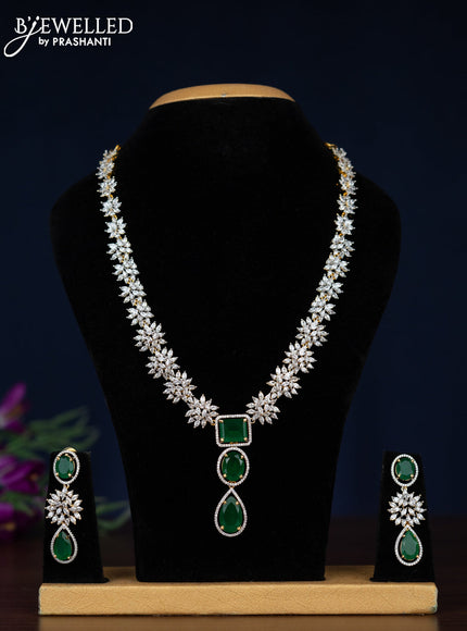 Zircon necklace with emerald and cz stones in gold finish