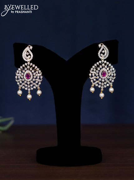 Zircon necklace manga pattern with ruby & cz stones and pearl hangings in gold finish