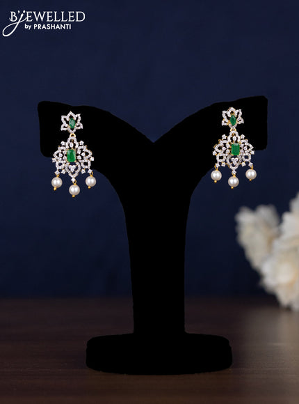 Zircon haaram with emerald & cz stones and pearl hangings in gold finish