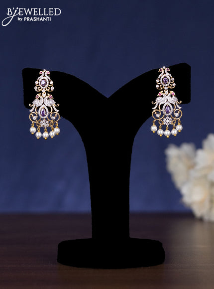 Zircon haaram with purple & cz stones and pearl hangings in gold finish