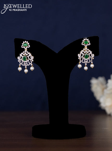 Zircon haaram with emerald & cz stones and pearl hangings in gold finish