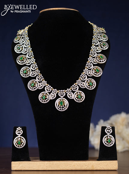 Zircon haaram with emerald and cz stones in gold finish