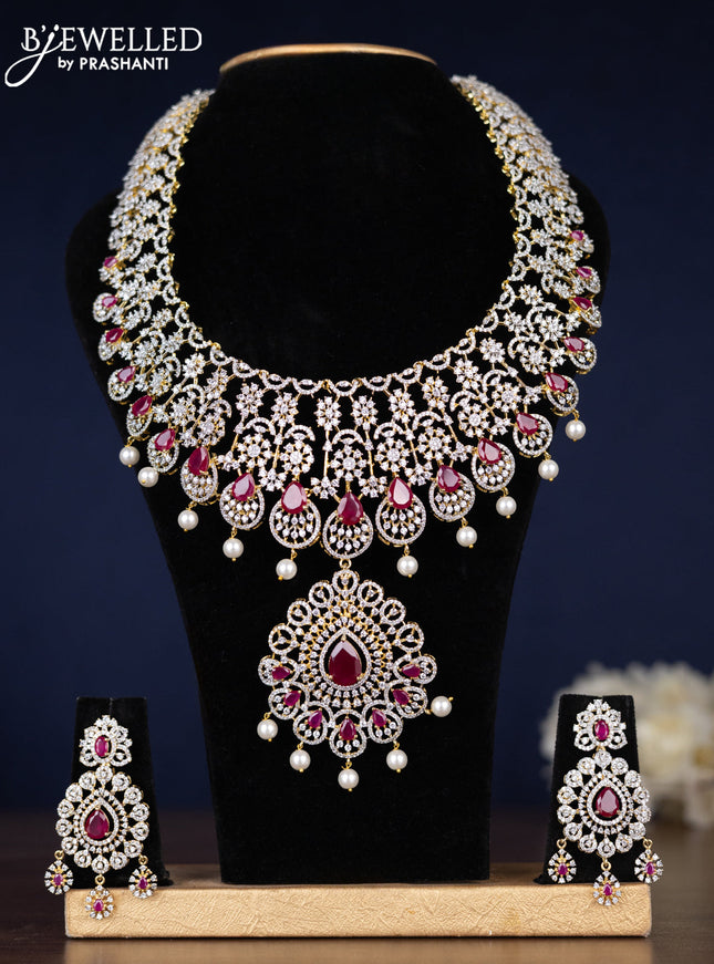 Zircon haaram detachable pendant with ruby & cz stones and pearl hangings in gold finish