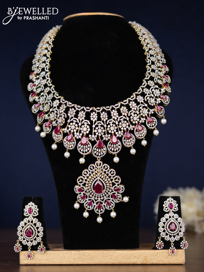 Zircon haaram detachable pendant with ruby & cz stones and pearl hangings in gold finish