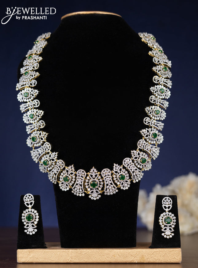 Zircon haaram with emerald and cz stones in gold finish