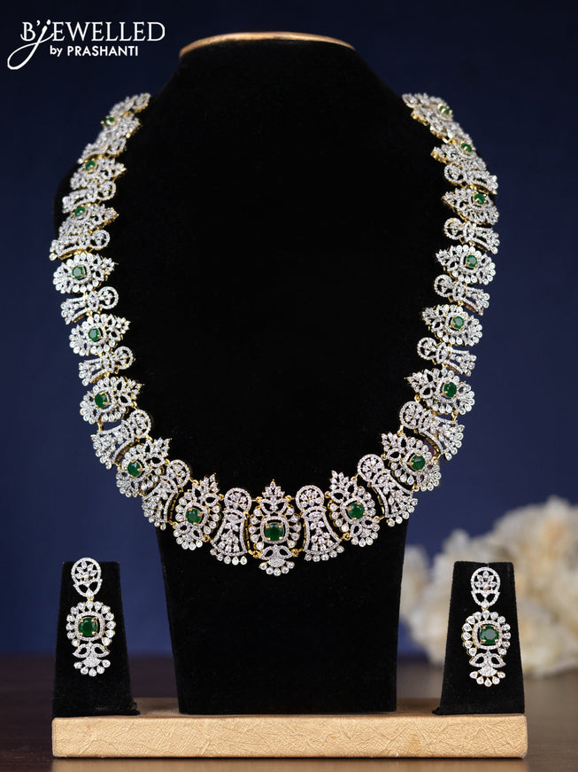Zircon haaram with emerald and cz stones in gold finish