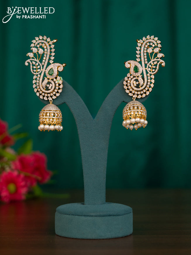 Zircon earcuff jhumkas manga pattern with emerald & cz stones and pearl hangings in gold finish