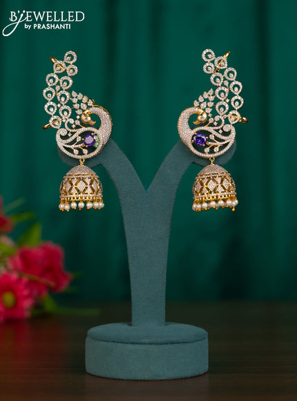 Zircon earcuff jhumkas peacock design with purple & cz stones and pearl hangings in gold finish