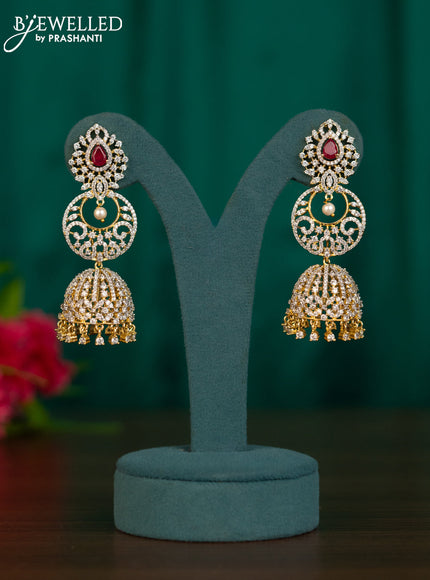 Zircon jhumkas with ruby & cz stones and hangings in gold finish