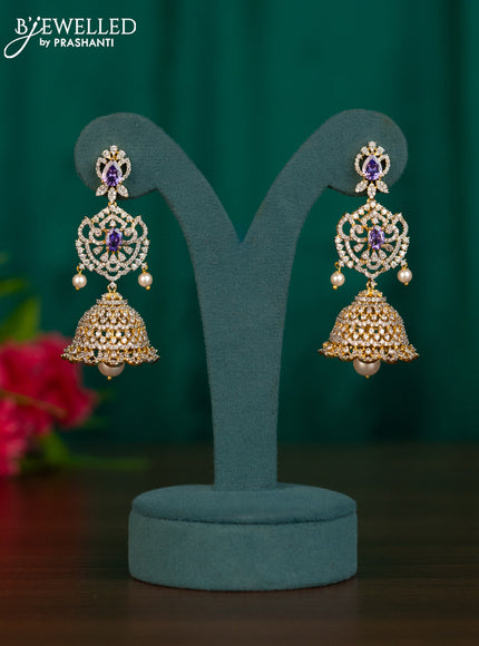 Zircon jhumkas with purple & cz stones and hangings in gold finish