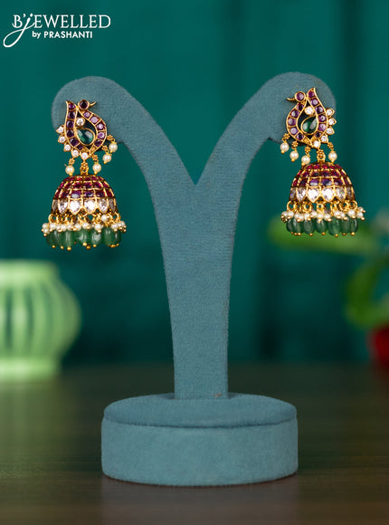 Antique jhumkas with kemp & cz stones and pearl & green beads hangings