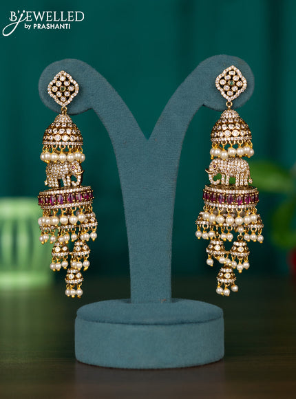 Jhumkas with ruby & cz stones and pearl hangings in victorian finish