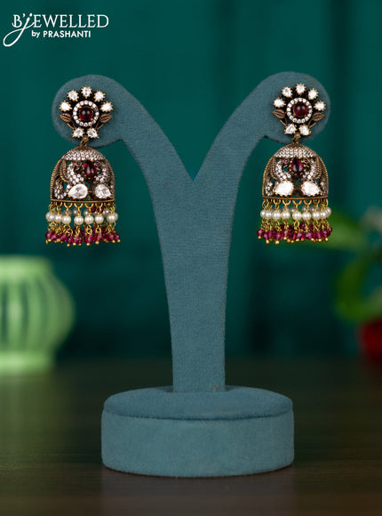 Jhumkas with ruby & kundan cz stones and pearl & pink beads hangings in victorian finish