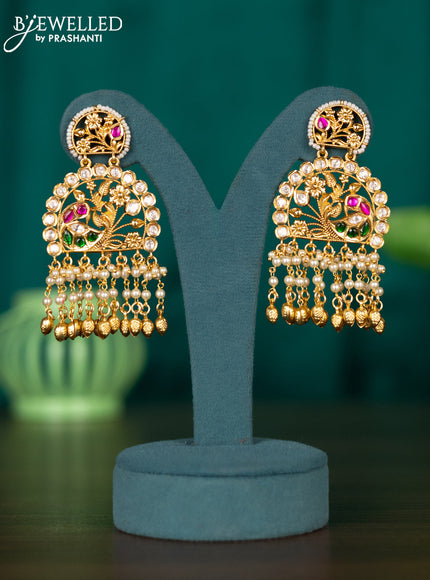 Antique earrings with jadau kundan stones and pearl hangings