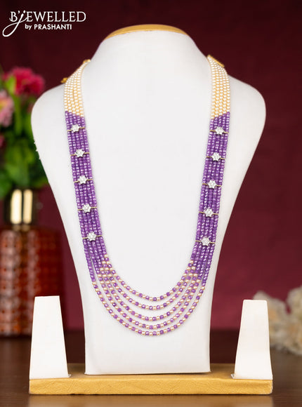 Beaded purple necklace with cz stones side pendant in zircon finish