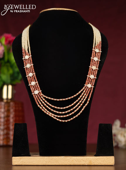Beaded brown necklace with cz stones side pendant in gold finish