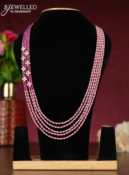 Beaded pink necklace with cz stones side pendant in gold finish