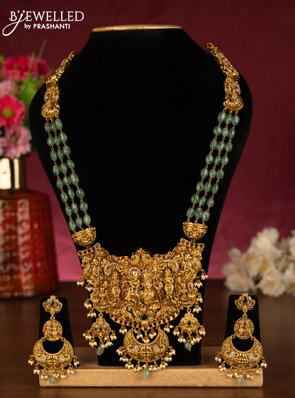 Antique beaded mint green haaram radhai krishna pendant with kemp & cz stones and pearl & beads hangings