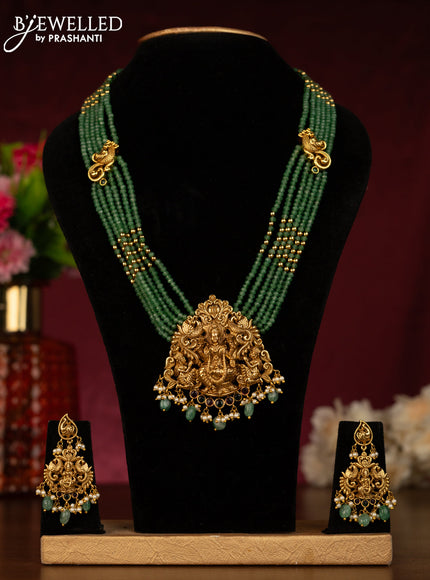 Antique beaded green haaram lakshmi pendant with kemp stones and pearl & beads hangings