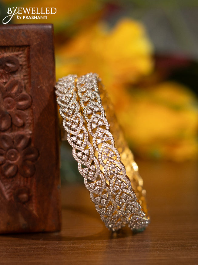Zircon bangles with cz stones in gold finish