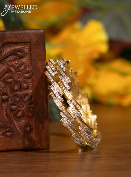 Zircon bangles with cz stones in gold finish