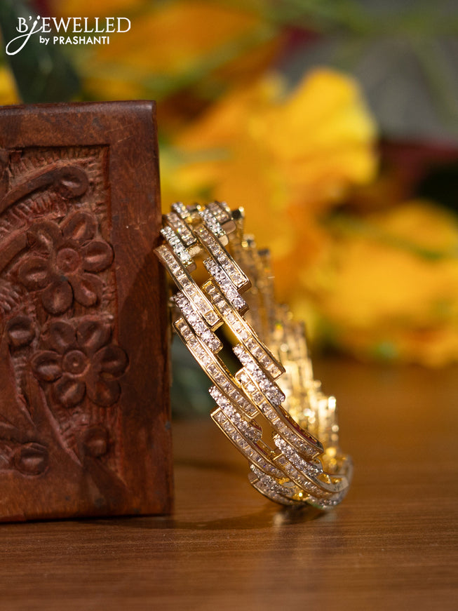 Zircon bangles with cz stones in gold finish