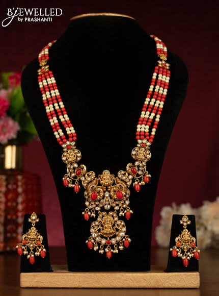 Beaded pavalam haaram lakshmi pendant with kundan stones and pearl hangings
