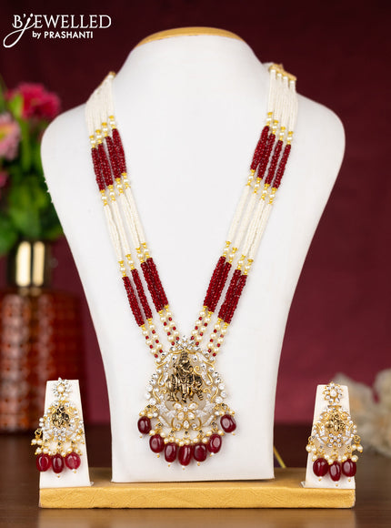 Beaded maroon neklace krishna pendant with kundan & cz stones and pearl & beads hangings