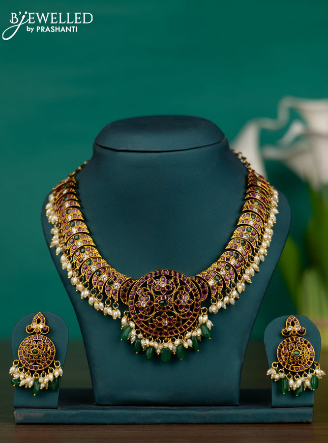 Antique guttapusalu necklace chandbali & floral design with kemp & kundan stones and pearl hangings & green beads hangings