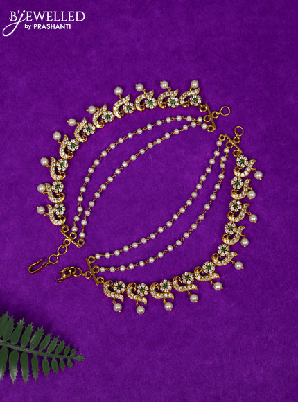 Antique triple layer maatal peacock design with kemp & cz stones and pearl hangings