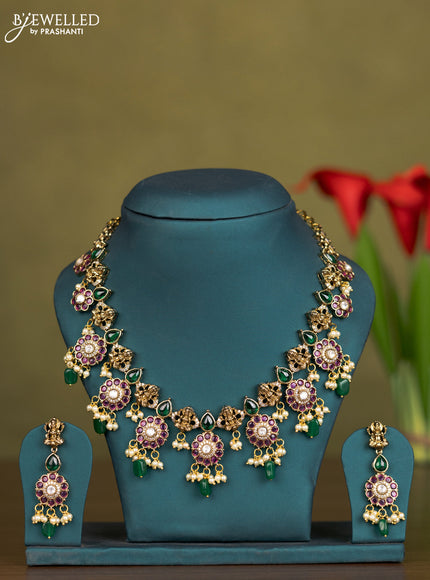 Necklace lakshmi & floral design with kemp & kundan cz stones and pearl & green beads hangings in victorian finish