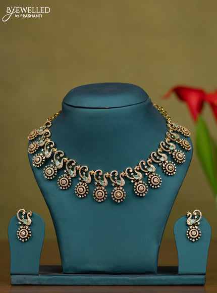 Necklace peacock design with mint green and cz stones in victorian finish