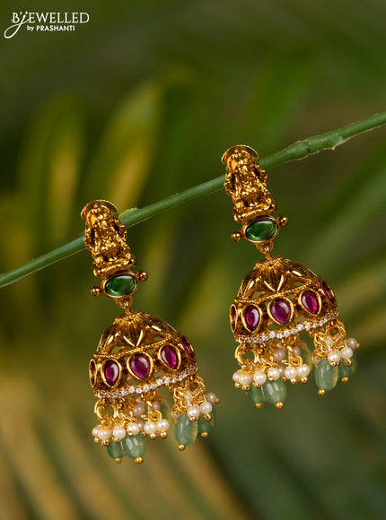Antique jhumka lakshmi design with kemp & cz stones and pearl & mint green beads hangings