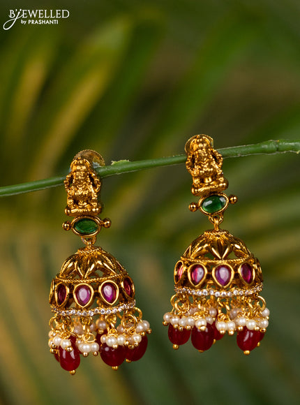 Antique jhumka lakshmi design with kemp & cz stones and pearl & pink beads hangings