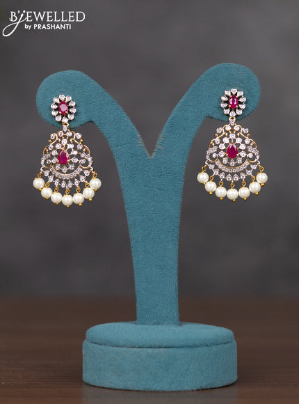 Zircon necklace with ruby & cz stones and pearl hangings in gold finish