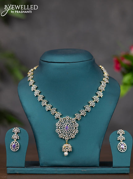 Zircon necklace with purple & cz stones and pearl hnaging in gold finish