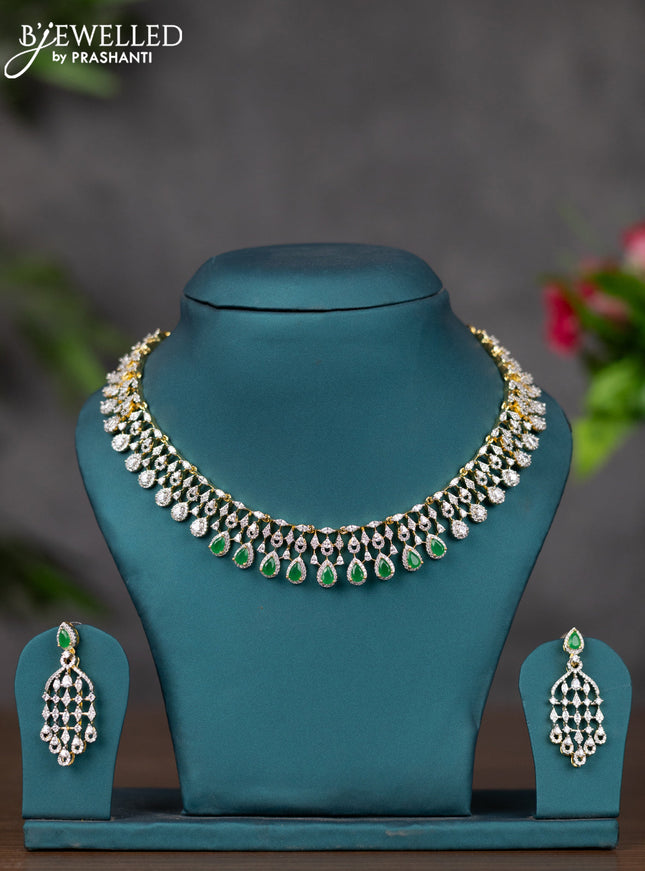 Zircon necklace with emerald and cz stones in gold finish