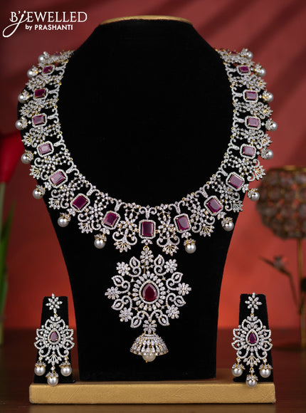 Zircon haaram detachable pendant with ruby & cz stones and pearl hangings in gold finish