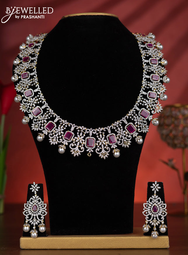 Zircon haaram detachable pendant with ruby & cz stones and pearl hangings in gold finish