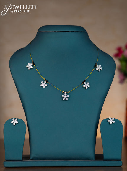 Invisible chain floral design with cz stones in gold finish