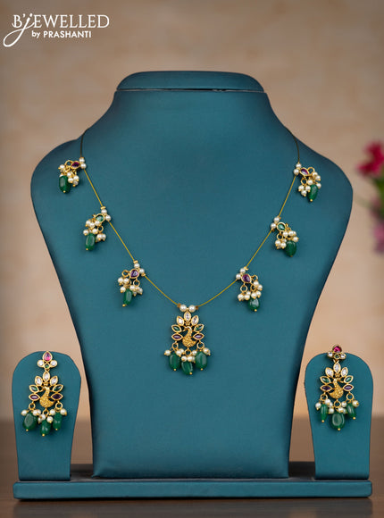 Invisible chain peacock design with kemp & kundan stones and pearl & green beads hangings