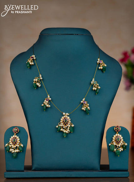Invisible chain with kemp & cz stones and pearl & green beads hangings