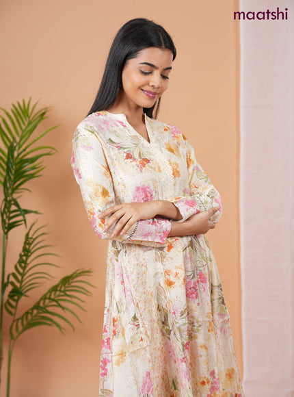 Rayon anarkali kurti cream with allover floral prints & sequin lace work neck pattern without pant