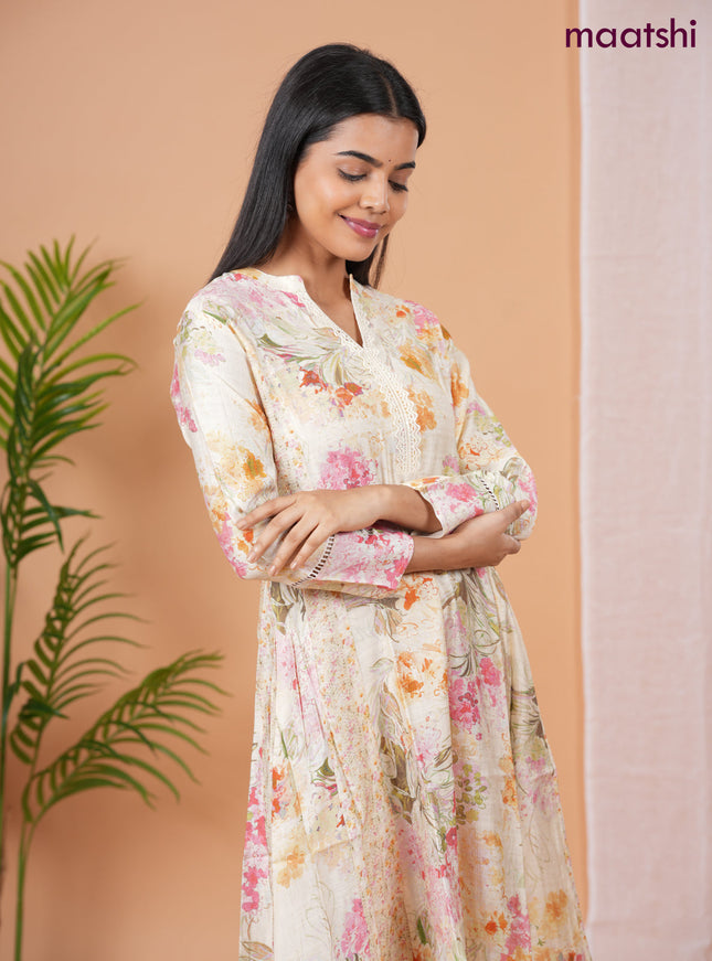 Rayon anarkali kurti cream with allover floral prints & sequin lace work neck pattern without pant