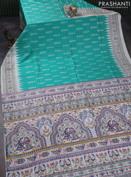 Pochampally silk saree teal green and cream with allover ikat woven buttas and madhubani prints
