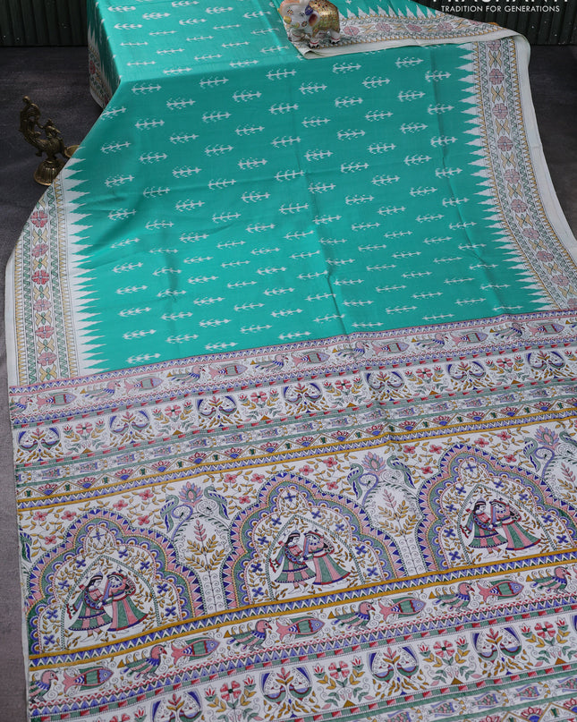 Pochampally silk saree teal green and cream with allover ikat woven buttas and madhubani prints