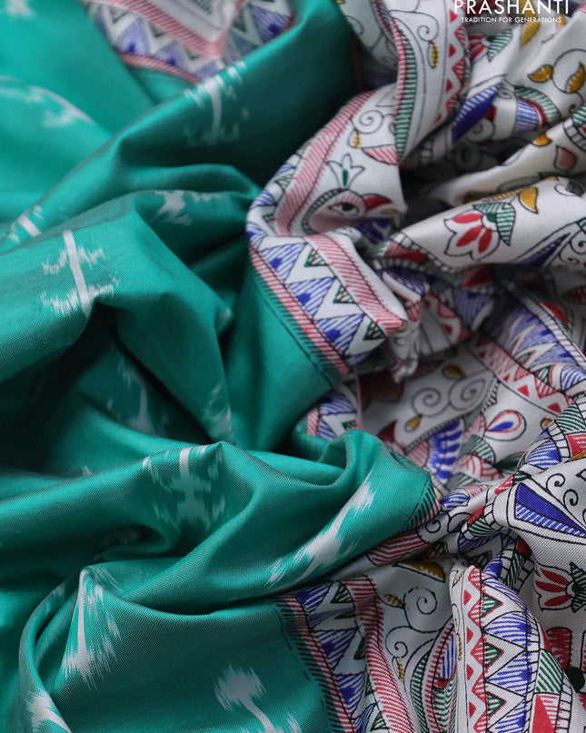 Pochampally silk saree teal green and cream with allover ikat woven buttas and madhubani prints