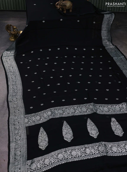 Banarasi chiffon saree black with silver zari woven buttas and floral silver zari woven border